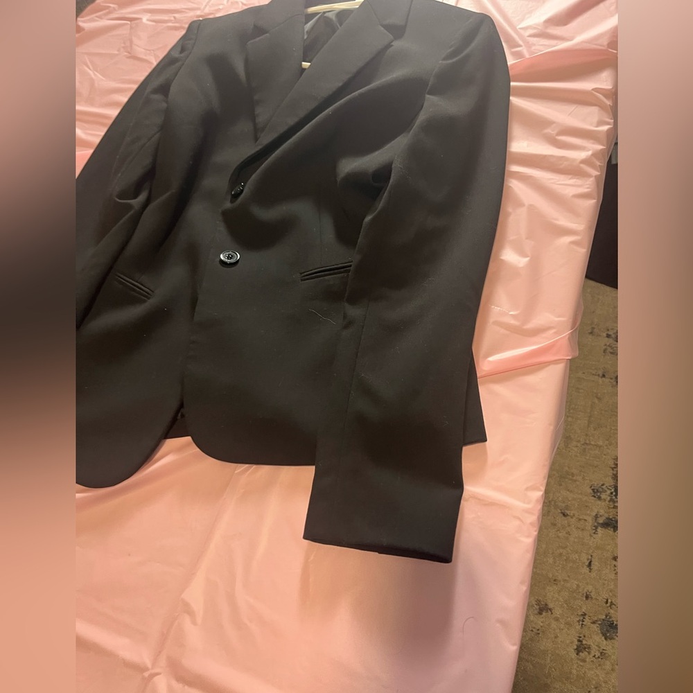 it is a nice leather and fits very well and can be tight but cute